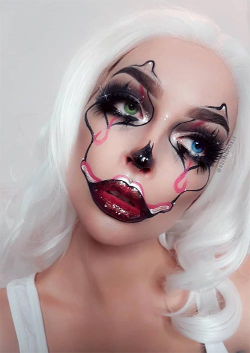 Artsy Clown Halloween Makeup : Les tourbillons et les accents distinguent ce clown. La différence entre les looks clownesques d'Halloween sera toujours le style de peinture.
